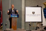 President unveils new logo